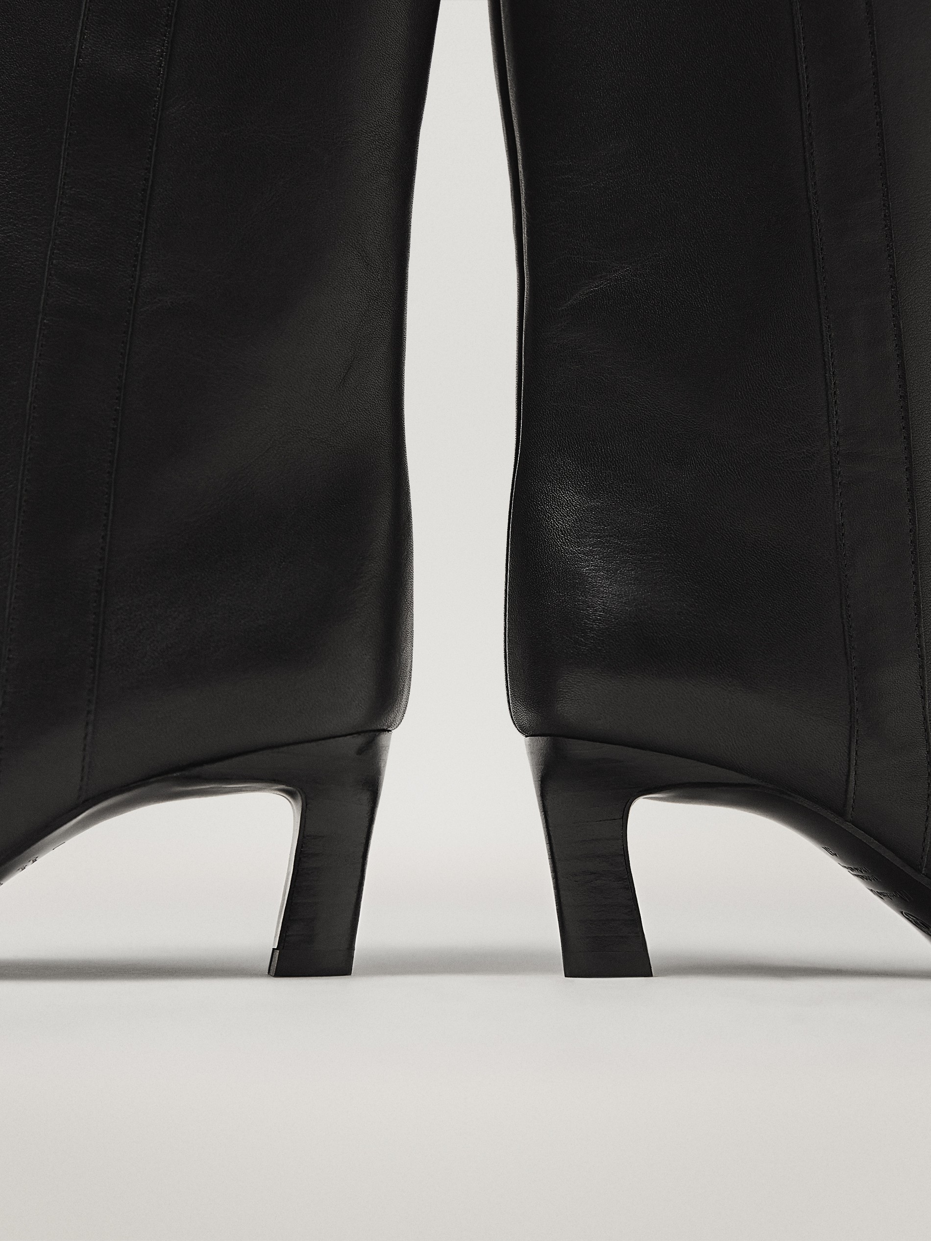 black leather mid heel ankle boots
