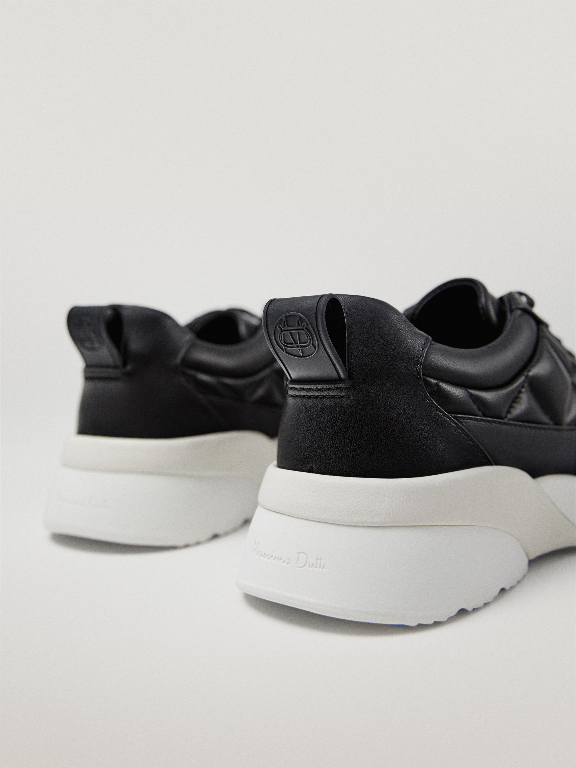 black leather trainers womens