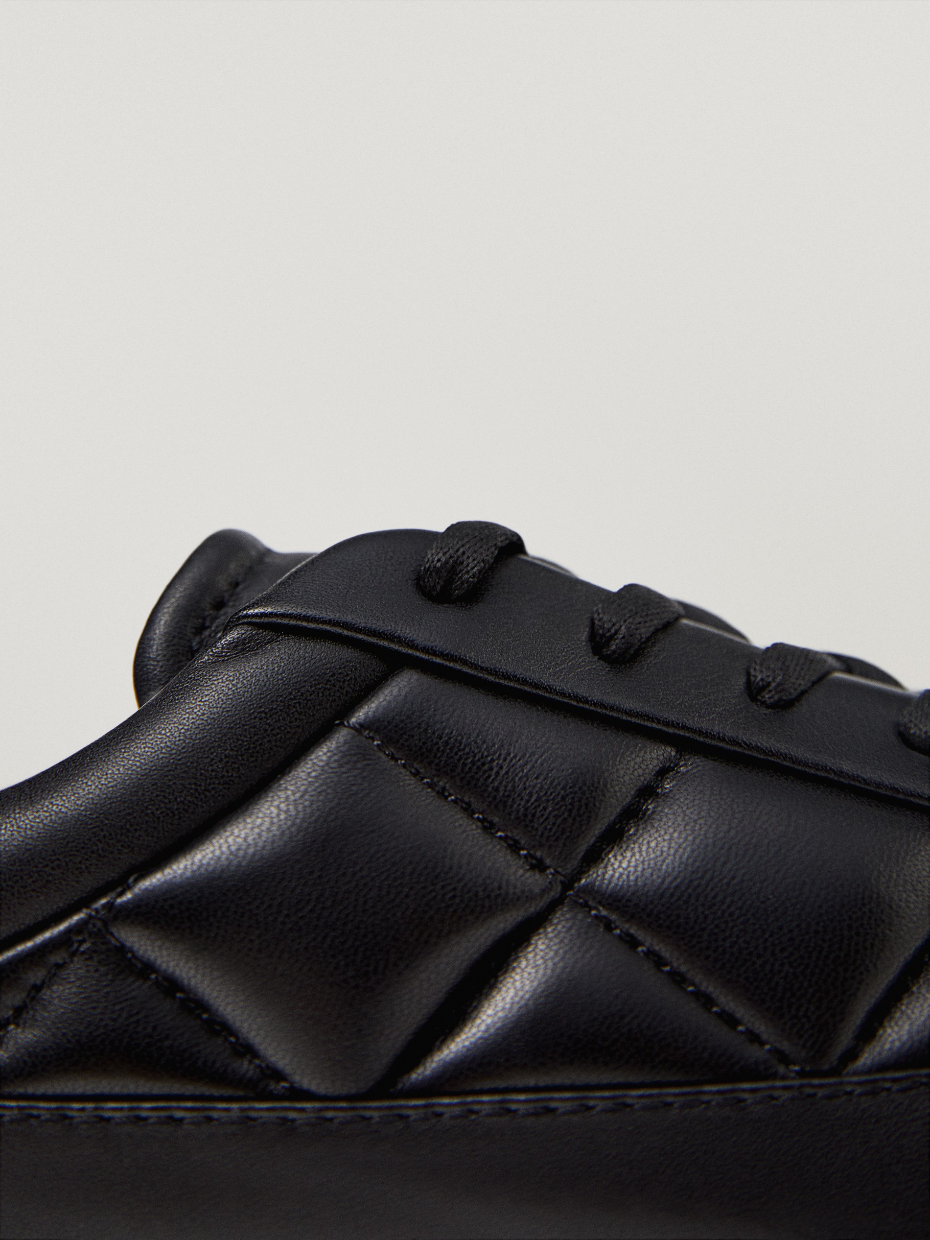 black leather trainers womens