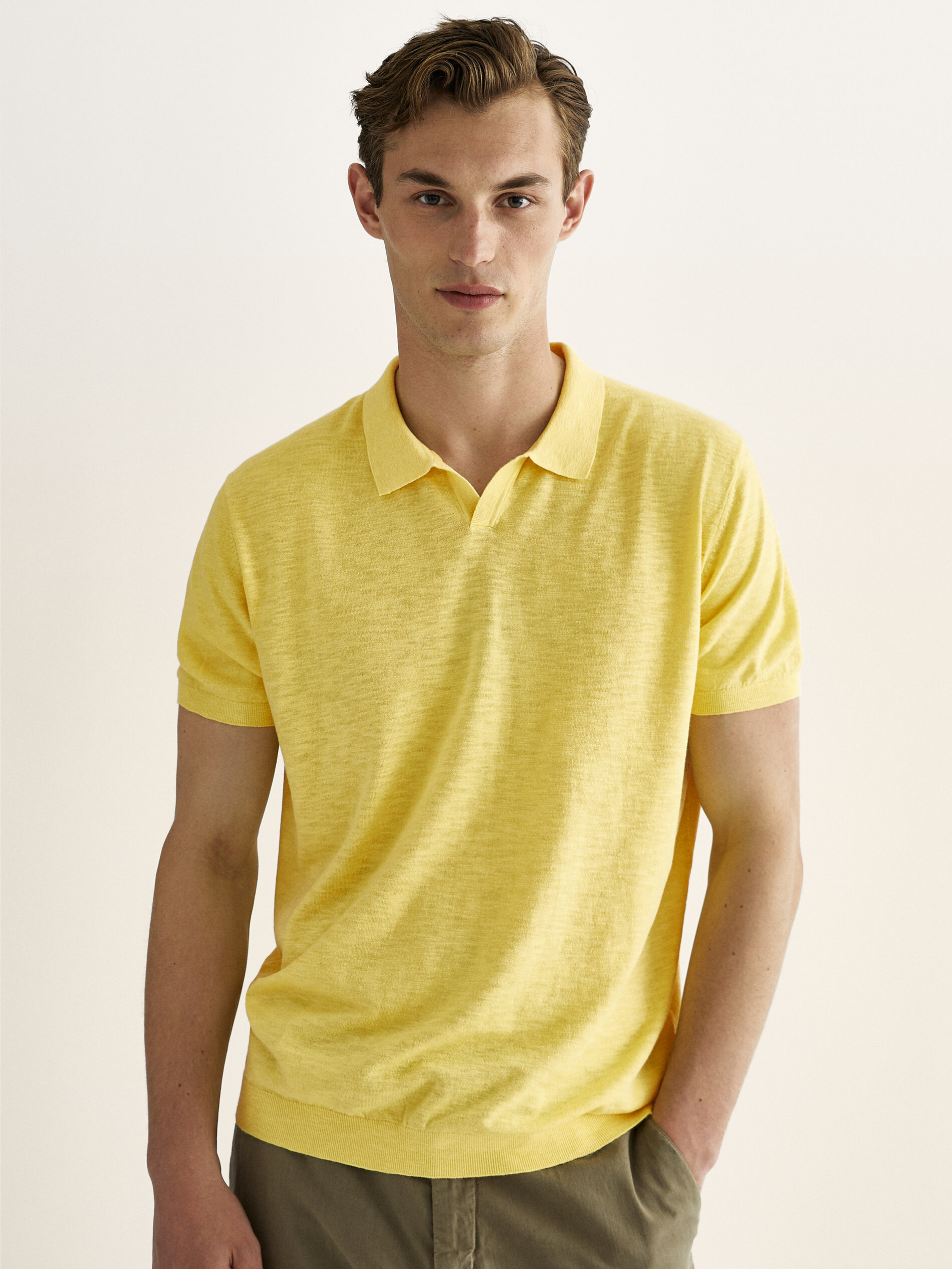 yellow v neck polo