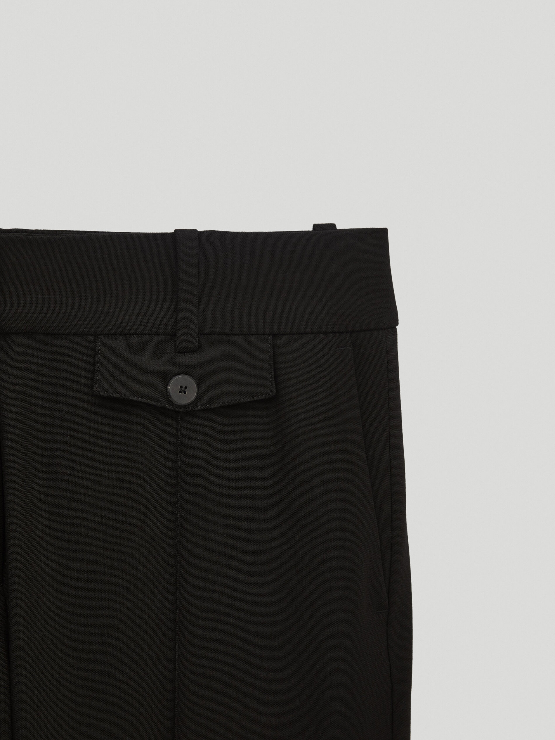 black bootcut trousers with pockets