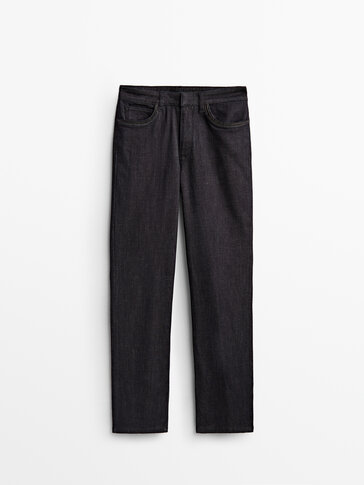 High-waist trousers with faux leather details