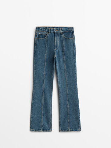 High-waist flared jeans with pronounced seams
