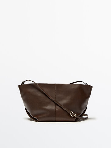 Leather crossbody and pouch trapeze bag