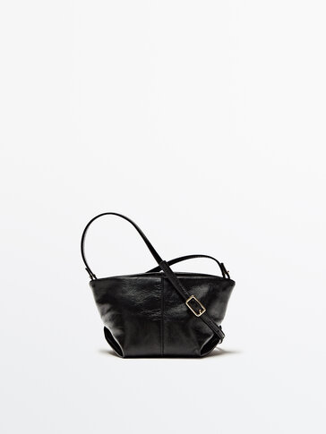 Mini leather crossbody and pouch trapeze bag