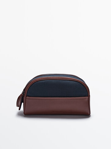 Canvas toiletry bag with double zip and leather details