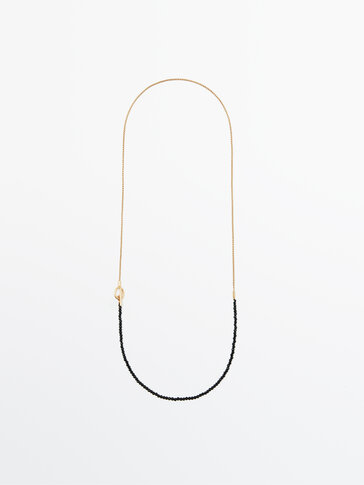 Gold-plated necklace with black stones