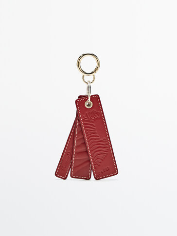 Charm keyring with leather tiger print straps