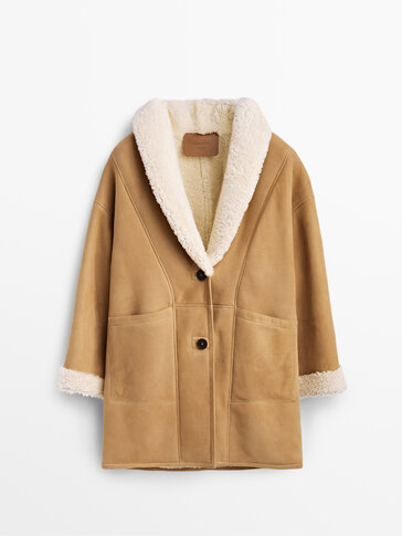 Double-faced camel-coloured leather coat