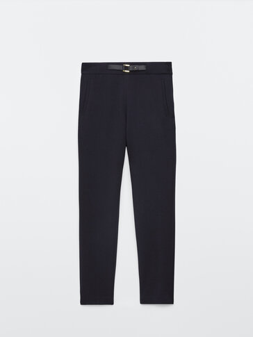 Trousers with front buckle