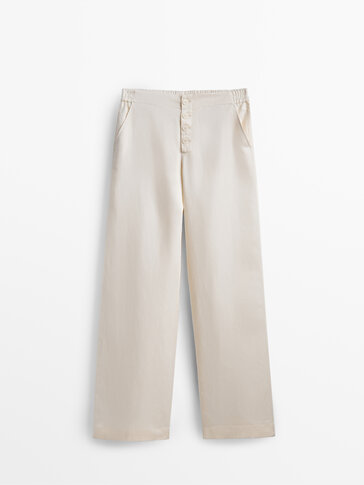 Wide-leg buttoned trousers