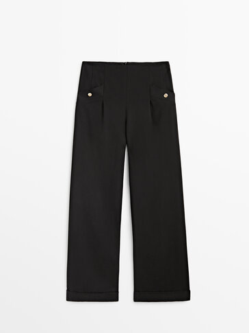 Suit trousers with golden buttons