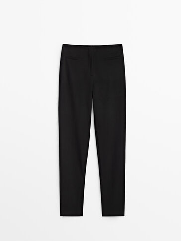 Skinny trousers with slit details