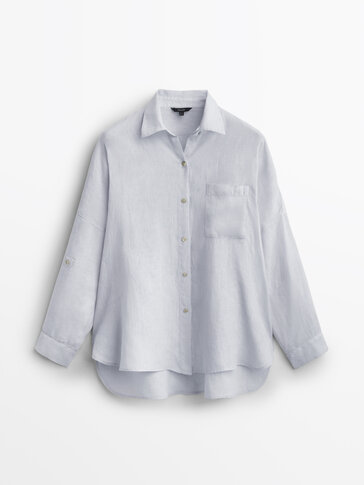 Washed linen shirt with rolled-up sleeves