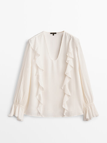 Ruffled blouse with devoré texture
