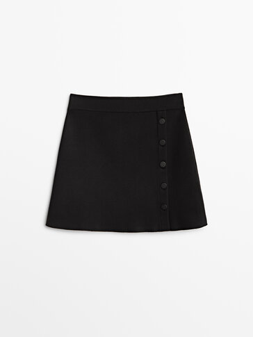 Buttoned knit mini skirt