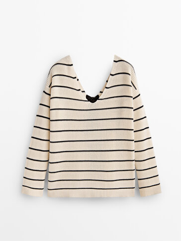 Striped knit sweater with tied detail at the back