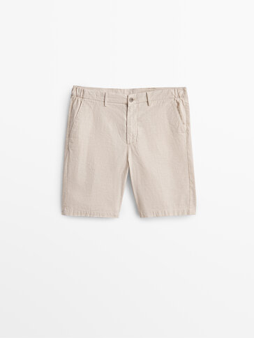 Pinstriped cotton and linen Bermuda shorts