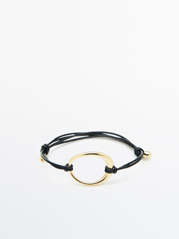 Leather cord bracelet with piece detail