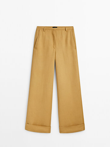Suit trousers with turn-up hems