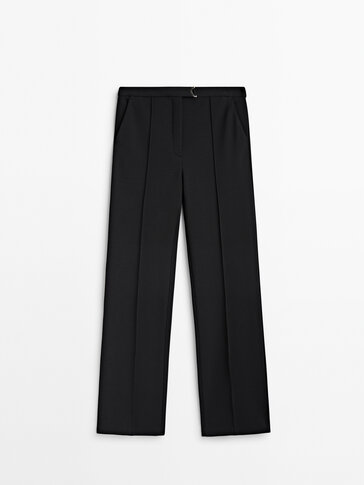Black seam trousers with metal detail