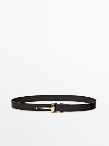 Leather belt with golden piece