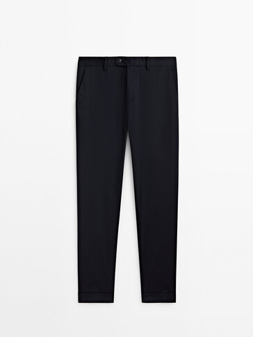 Cotton blend trousers with turn-up hems