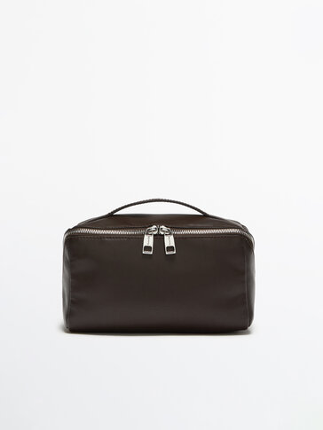 Leather toiletry bag with diagonal zip
