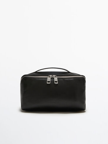 Leather toiletry bag with diagonal zip