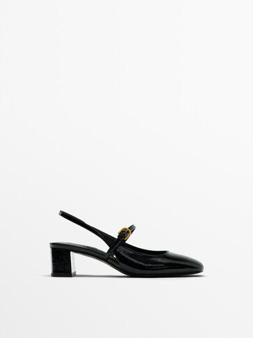 Patent finish slingback shoes with buckled strap