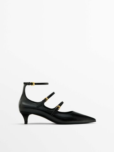 Pointed court shoes with buckled straps