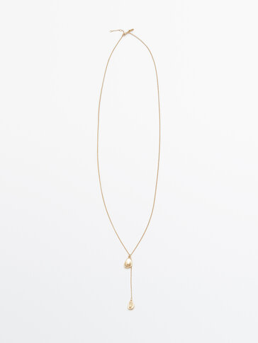 Long necklace with oval pieces