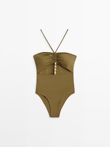 Cut-out swimsuit with stone details