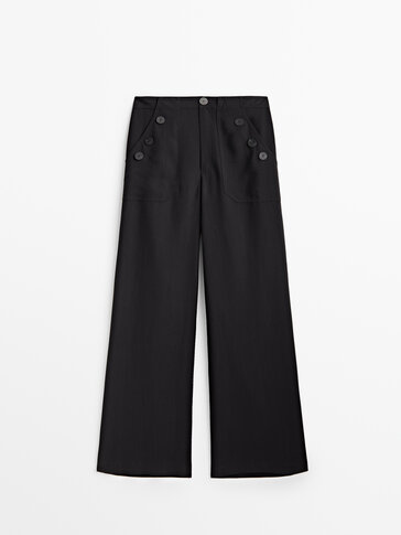 Wide-leg trousers with button details