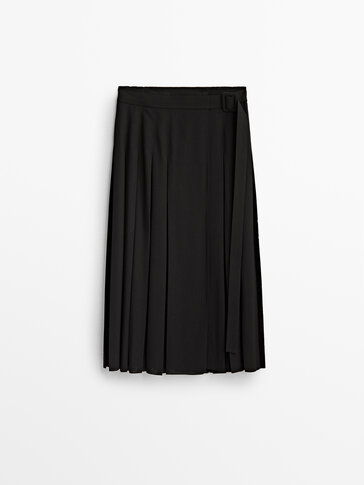 黑色盒褶中长半身裙