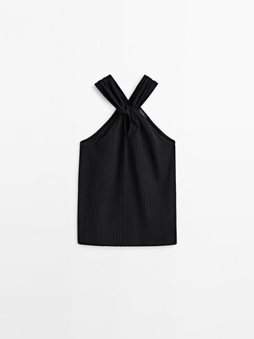 Textured top with crossover strap detail