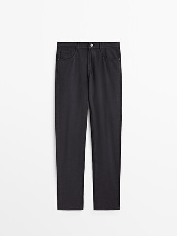 Tapered-fit denim-effect trousers