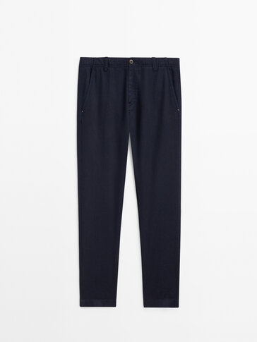 Tapered-fit denim-effect trousers