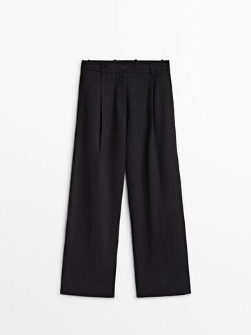 Full length darted black trousers