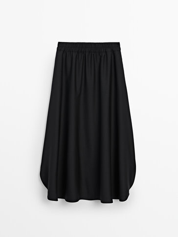 Long skirt with slits and elastic waistband