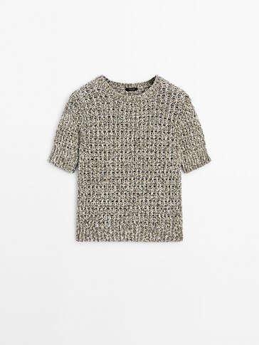 Short sleeve knit sweater with a crew neck