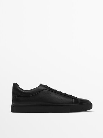 Black leather trainers