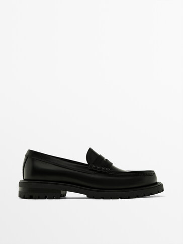 Black track sole loafers with penny strap