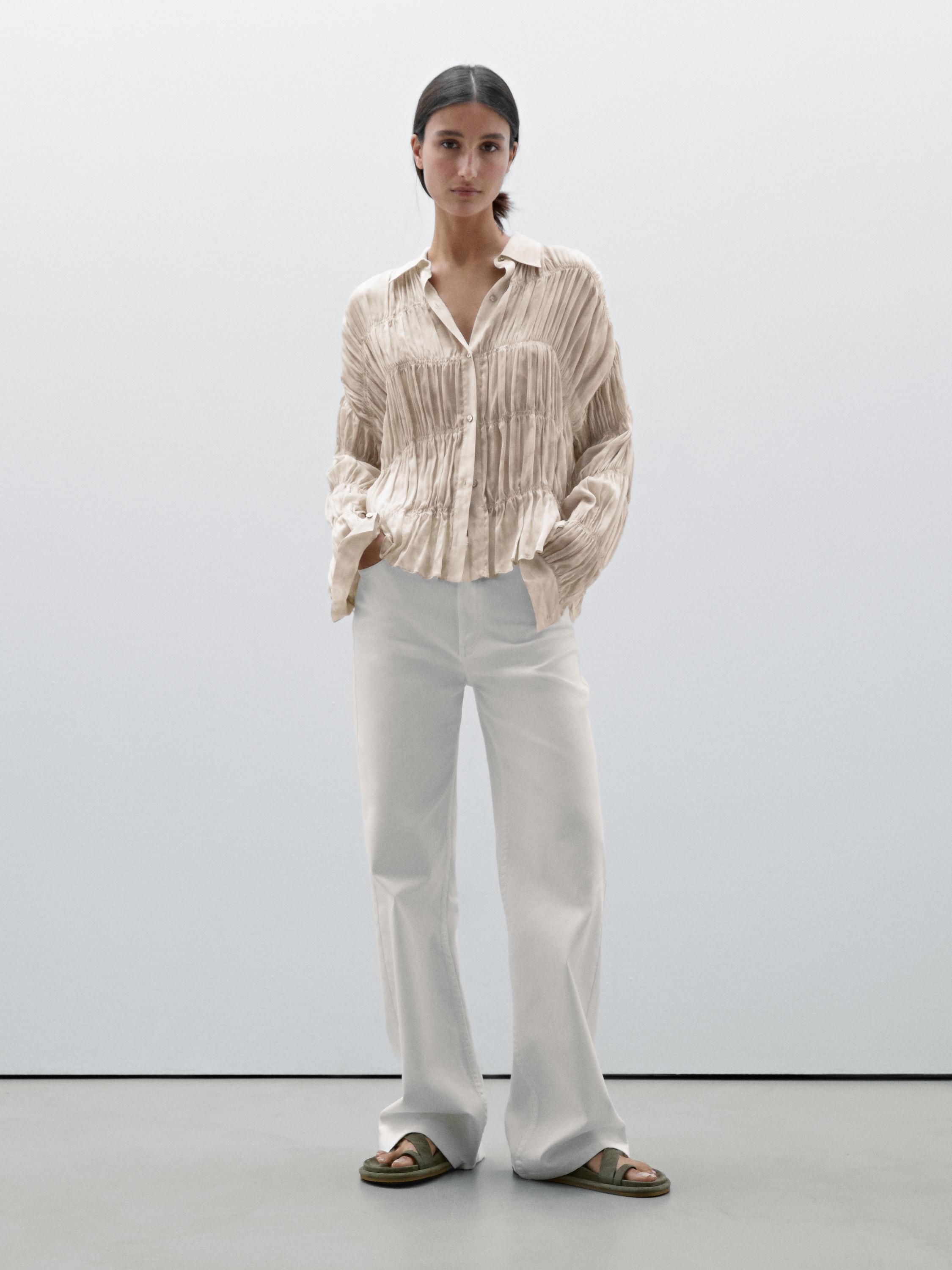Flowing shirt with gathered details