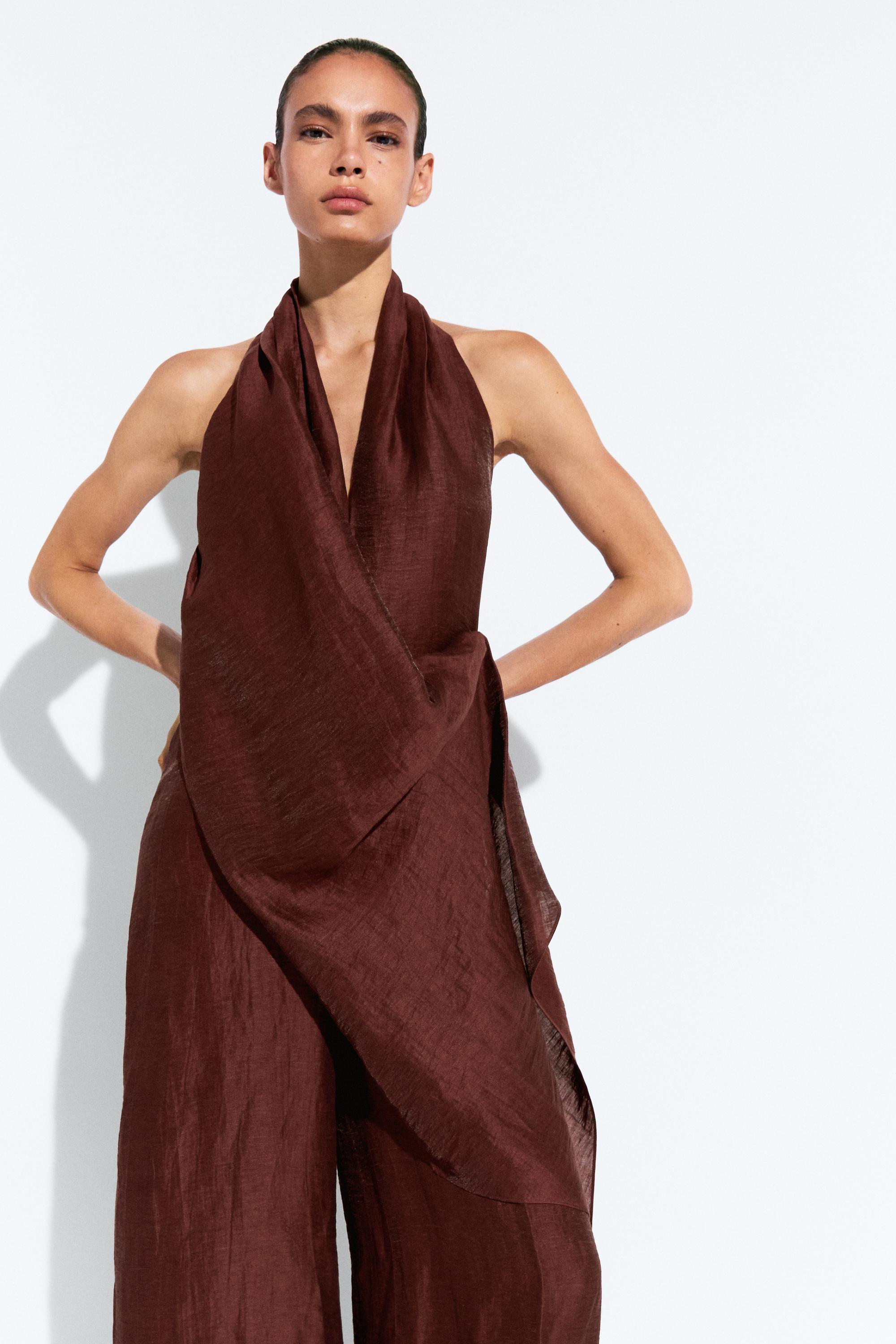 Flowing draped halter neck jumpsuit