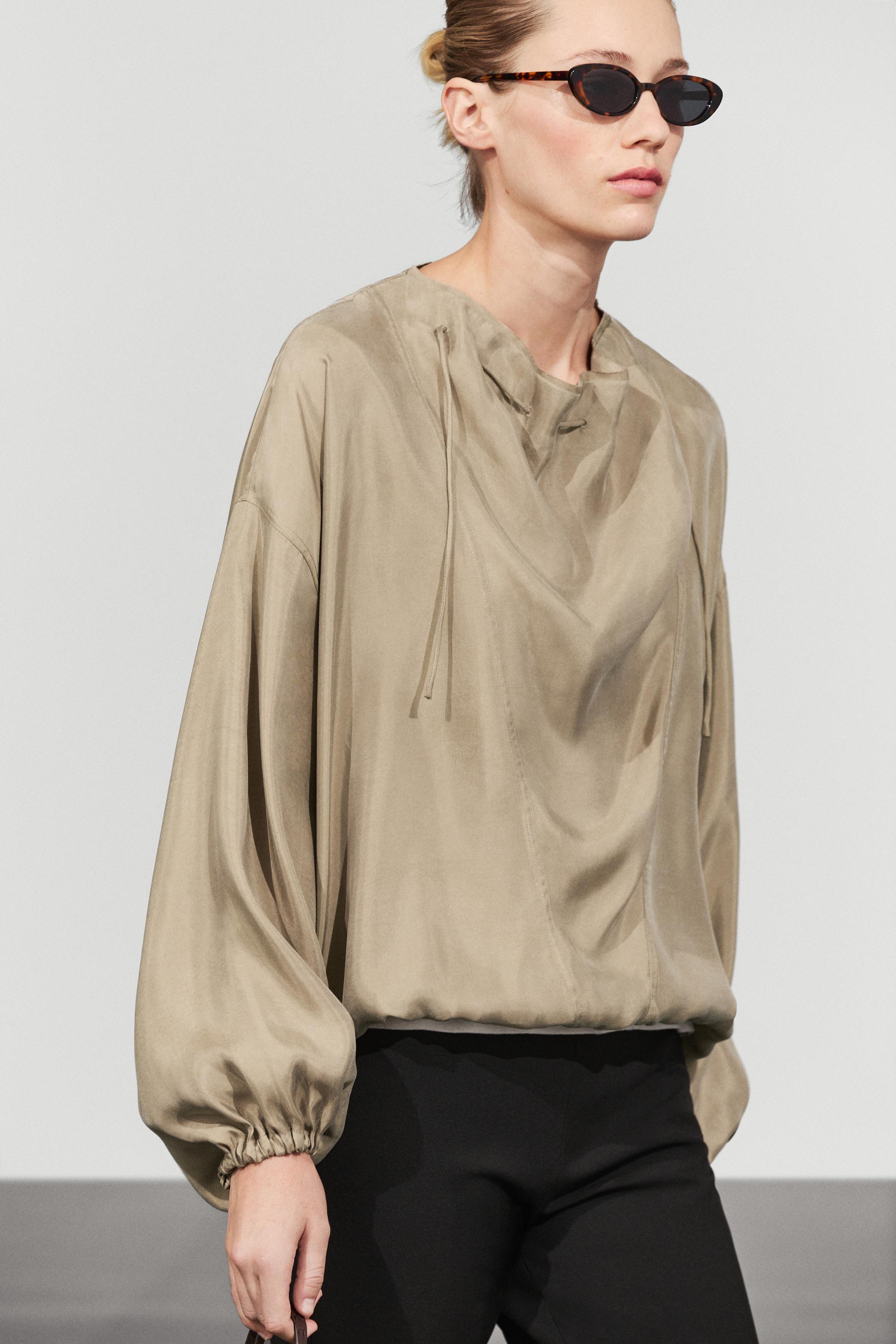 Flowing blouse with drawstring neck detail