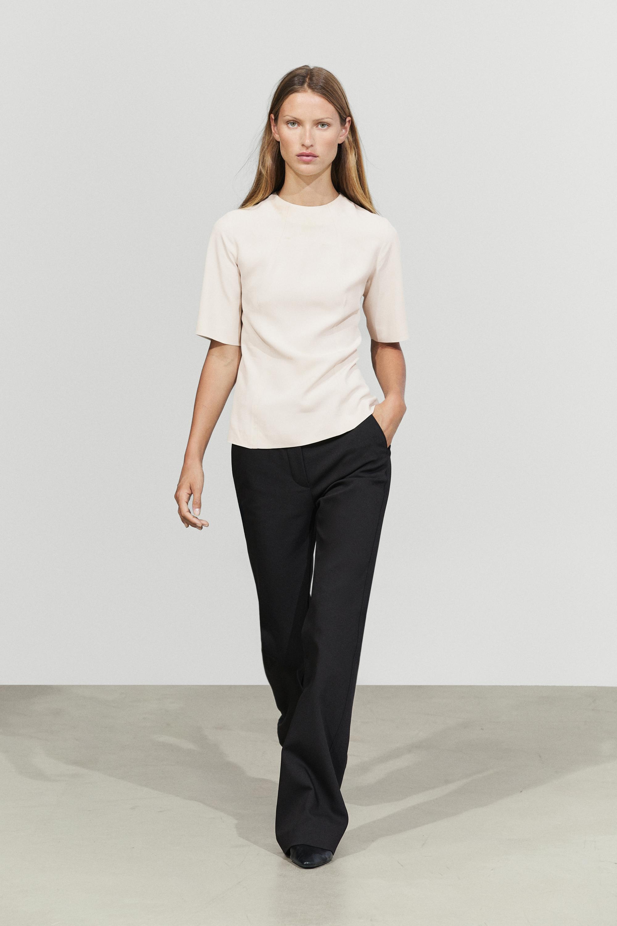 Flowing elbow-length sleeve top