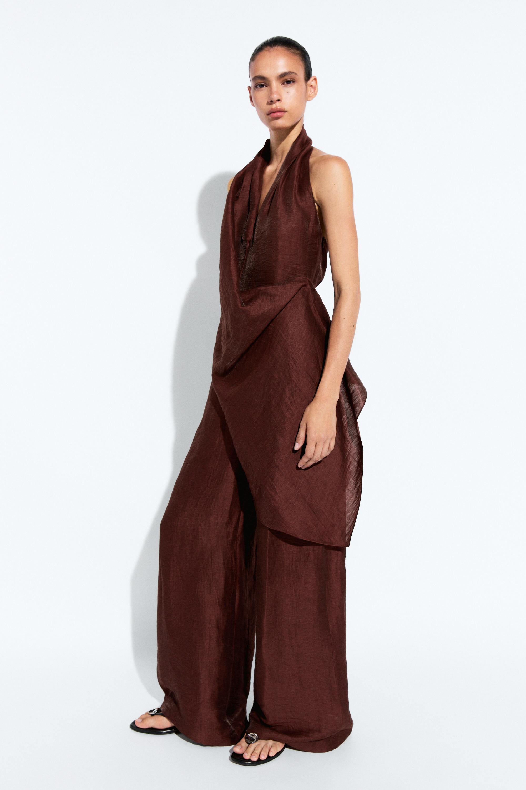Flowing draped halter neck jumpsuit