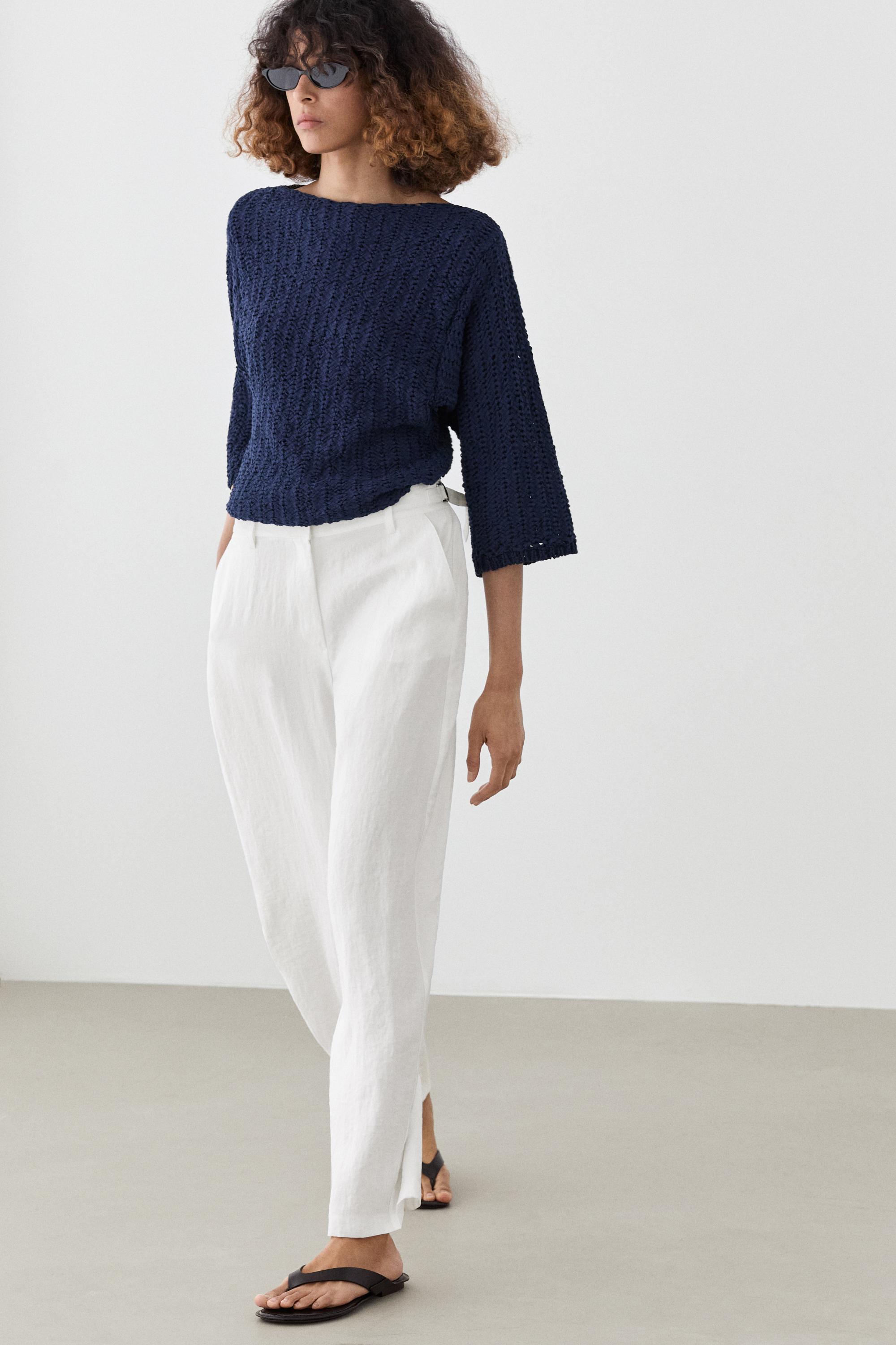 Flowing trousers with buckles