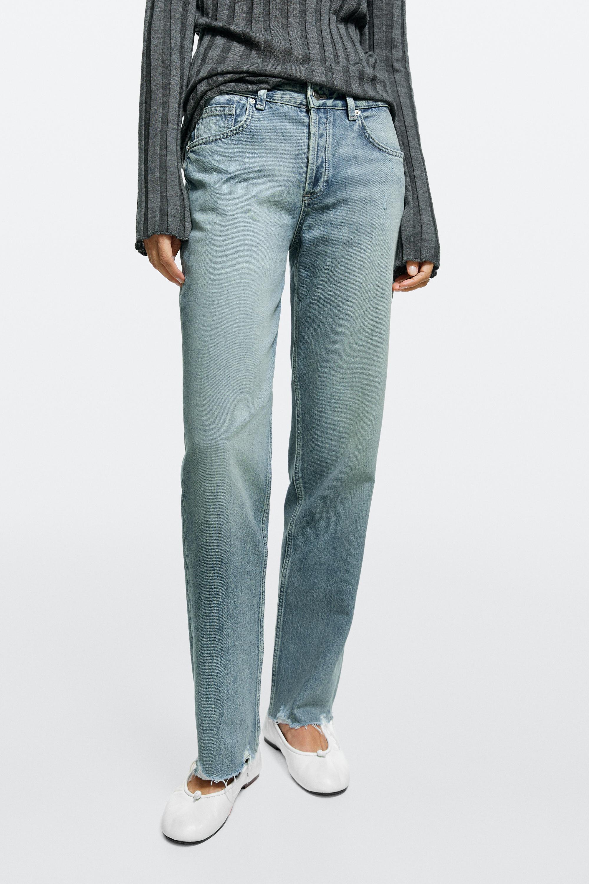 Mid-waist stovepipe jeans with frayed hems